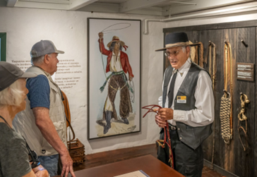 Volunteer talking to guests